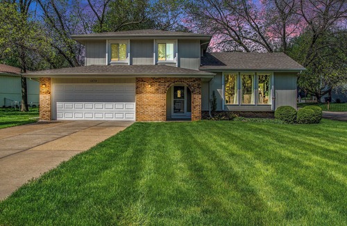 West Omaha House | Elegant Golden Getaway, w/Hot Tub & Fenced Yard!