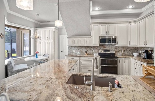 Lakeland House | Elegant Home with Pool, Office, Theater, and Fence