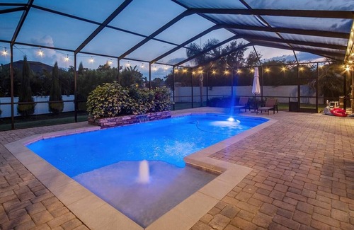Lakeland House | Elegant Home with Pool, Office, Theater, and Fence