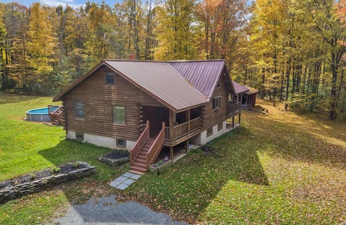 South Gibson Ski Chalet | Elegant log chalet w/hot tub sitting on 36 private acres