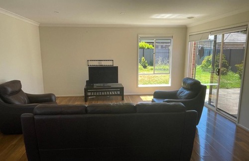 Point Cook House | Elegant master bedroom with private bathroom