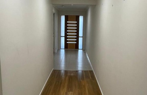 Point Cook House | Elegant master bedroom with private bathroom