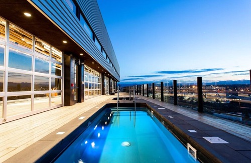 River North Art District Hotel | Elegant Mountain View Suite with Spacious Interiors and Stunning Scenic Views