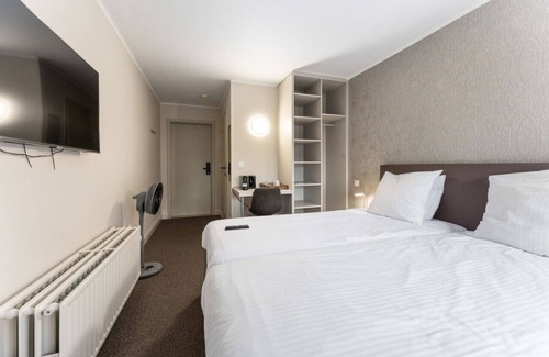 Historical Center Bruges Hotel | Elegant Room in Bruges' Heart