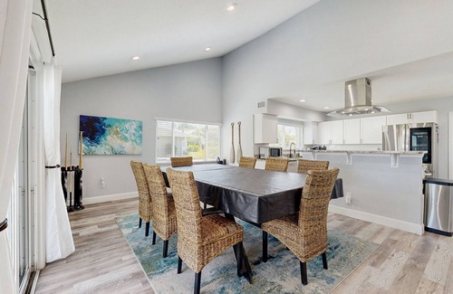 Palm Harbor House | Elegant sound view home with enclosed pool, dock, pool table, fireplace, & grill