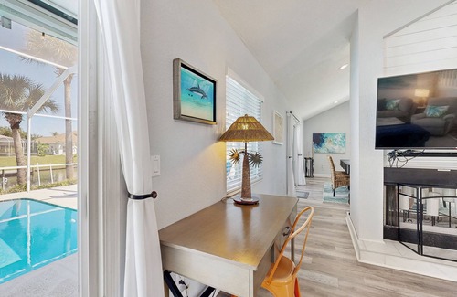 Palm Harbor House | Elegant sound view home with enclosed pool, dock, pool table, fireplace, & grill