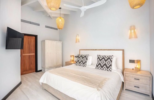 Fryes Beach Hotel | Elevated Beachside Charm with Living Area with Unmatched Caribbean Serenity
