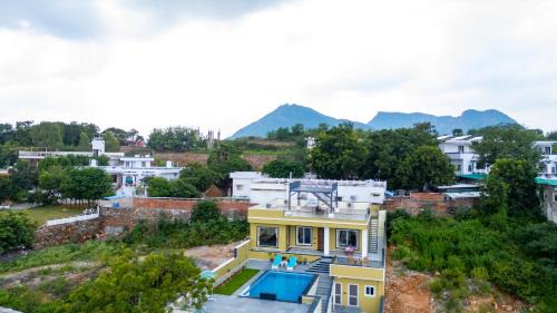 Udaipur District Villa | ELIVAAS Fatehsagar 2-BHK Getaway with Private Pool, Open-Air Gazebo & Terrace At Fatehsagar Lake