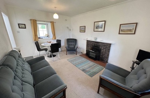 Lochgilphead House | Ellary Cottage - Cosy, Romantic Water-side Escape, Sleeps 2-4 open fire