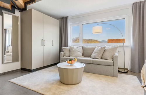 Denzlingen Apartment | EMPiRE: Marketplace | Balcony | Mountain view | Parking