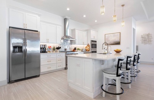 Palm Coast House | Enchanting house with heated pool, full kitchen, central AC, & washer/dryer