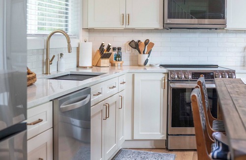 Hayden Lake House | Enchanting lake view 3-bedroom house in the woods in Hayden Lake, hot tub, A/C