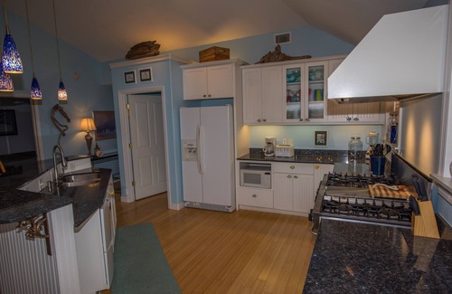 Ocean Springs House | Enchanting Spacious Beach House With Hot Tub, Game Room, Tiki Bar & Fishing Dock