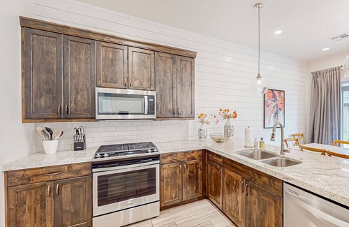 Ivins House | Enchanting townhome with pool, hot tub, fire pit, games, & great balcony views