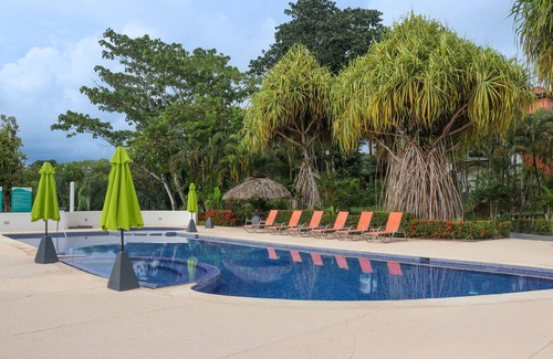Esterillos Este Condo | Enchanting & tropical escape with pool, spacious balcony, W/D, & amazing views