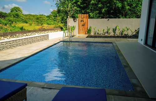 Bukit Villa | Enchanting villa with AC in vibrant Badung