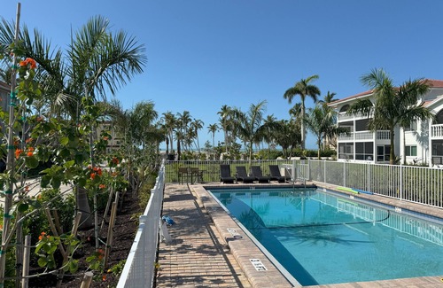 Sanibel Condo | End unit with extra windows. Steps to the beach, private beach access!
