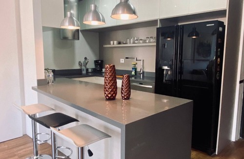 Las Lomas I Apartment | Energy Living! JACUZZI! Huge Patio! 1 Bedroom + Office/2nd Br! 18th floor!