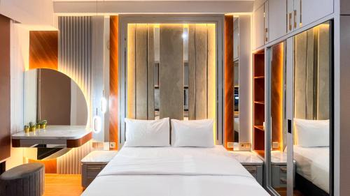 Tetebatu Apartment | Enigma Studio at Apartment Delft Ciputra Makassar By Travelio
