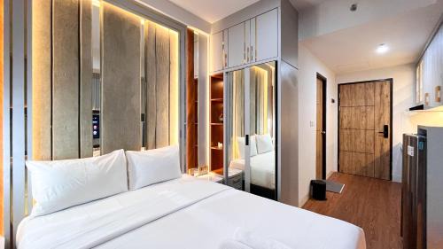 Tetebatu Apartment | Enigma Studio at Apartment Delft Ciputra Makassar By Travelio