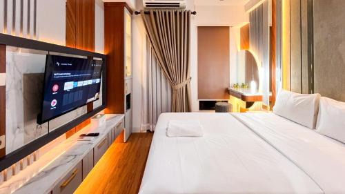 Tetebatu Apartment | Enigma Studio at Apartment Delft Ciputra Makassar By Travelio