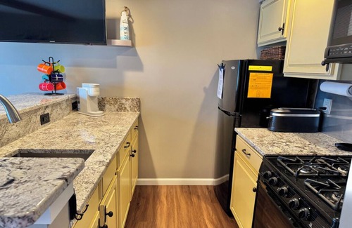 Onekama Condo | ENJOY 2 LAKES: NEW Portage Lakefront condo w/2 Kayaks, walk to Lake Michigan!