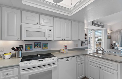 Palm Island Villa | Enjoy a Beautiful Gulf Sunset from the Screened Porch on Resort Villa A3221B