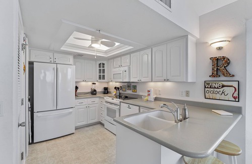 Palm Island Villa | Enjoy a Beautiful Gulf Sunset from the Screened Porch on Resort Villa A3221B