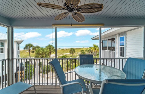 Palm Island Villa | Enjoy a Beautiful Gulf Sunset from the Screened Porch on Resort Villa A3221B