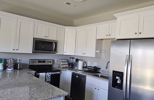 Harrisburg House | Enjoy a convenient 3BR House near Charlotte Motor Speedway, UNCC, & Charlotte.