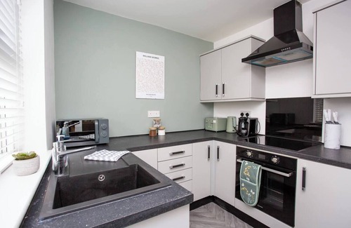 Woodhorn House | Enjoy a cozy 3-bedroom retreat at Newbiggin-by-the-Sea, just a short walk from the beach