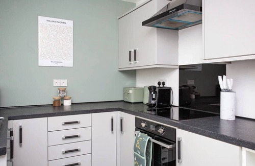 Woodhorn House | Enjoy a cozy 3-bedroom retreat at Newbiggin-by-the-Sea, just a short walk from the beach