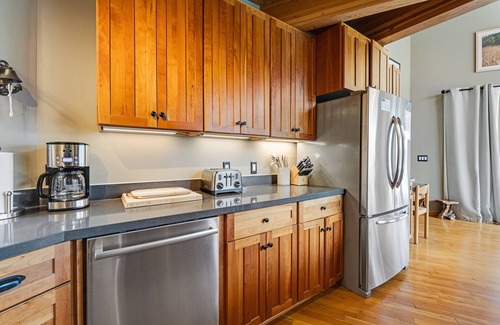 Sea Ranch House | Enjoy a private hot tub, deck, distant ocean view, fireplace, and pool