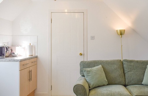 Killin Cottage | Enjoy a relaxing stay at Pine Cottage, a first floor apartment where you can participate in a game o
