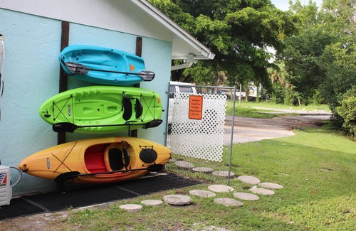 Fort Myers House | Enjoy a stunning waterfront view, pool table,kayaks, fishing, BBQ, heated & pool