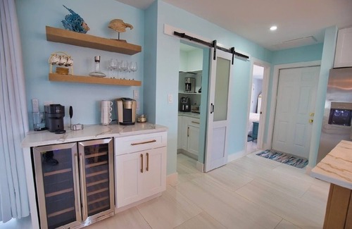 Punta Gorda House | Enjoy a tranquil vacation on expansive canal with passing boats and heated pool.
