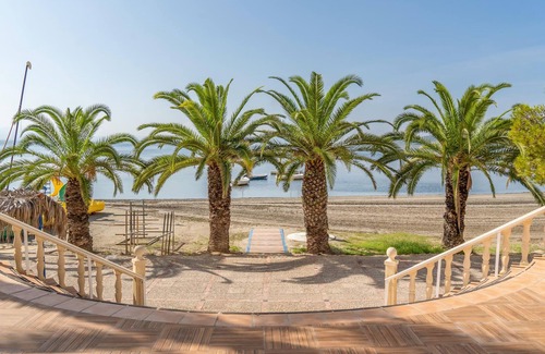 San Javier Apartment | Enjoy a unique panoramic view of the sea in this beachfront vacation rental.