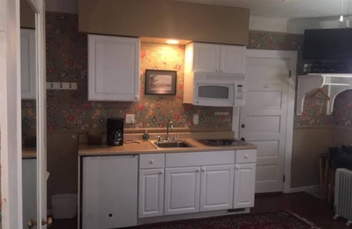 Frankfort House | Enjoy a view of Betsie Bay from your studio suite a block from Lake Michigan