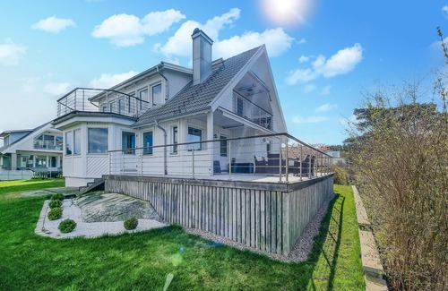 Vastra Frolunda House | Enjoy a wonderful view of the archipelago in this comfortable vacation home with sauna.