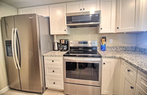 Amelia City Condo | Enjoy Corner Office Beach Views In This Top Floor Condominium