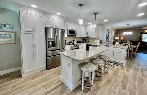 Butler Beach Condo | Enjoy FREE FUN Every Day during your stay in this spacious Gold-rated condo perfect for enjoying the beautiful Florida weather.