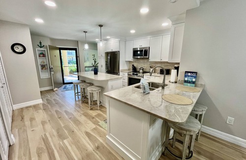 Butler Beach Condo | Enjoy FREE FUN Every Day during your stay in this spacious Gold-rated condo perfect for enjoying the beautiful Florida weather.