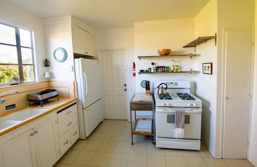 West Beach Apartment | Enjoy indoor-outdoor living, a full kitchen and walk to beach and state st.