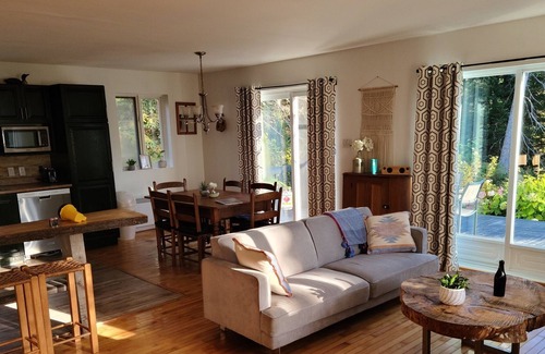 Mauricie Cottage | Enjoy our secluded 125' shoreline on the Rivière-du-Loup surrouded by trees