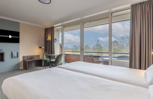Exloo Hotel | Enjoy Scenic Cycling Trails & Tennis, Plus Indoor Pool Access and Free Parking