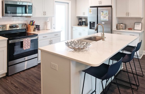 Morehead City House | Enjoy sea breezes from double-decker porch - walk to pool, private waterfront.