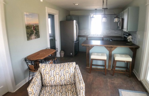 Port St. Joe Cottage | Enjoy sunrise and sunsets on the huge deck and covered bar!
