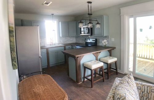 Port St. Joe Cottage | Enjoy sunrise and sunsets on the huge deck and covered bar!