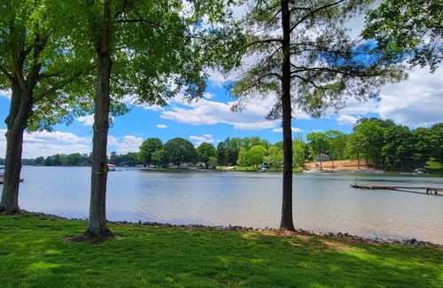 Troutman House | Enjoy the beauty of lake life in this waterfront home .