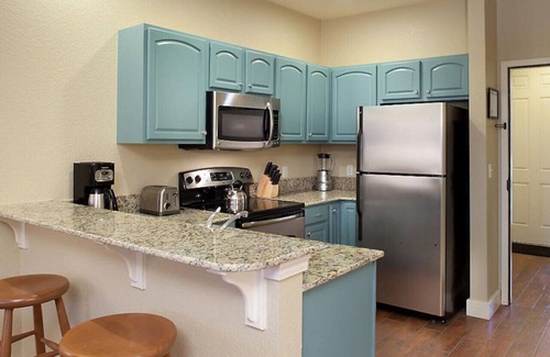 Boyne City Apartment | Enjoy the family for ski adventures in 2BD condo with resort amenities